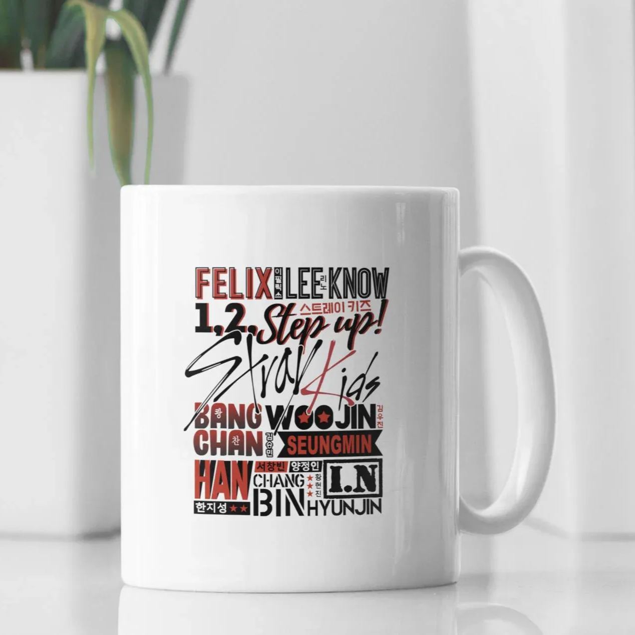 White ceramic mug featuring Stray Kids member names and collage design printed on the side