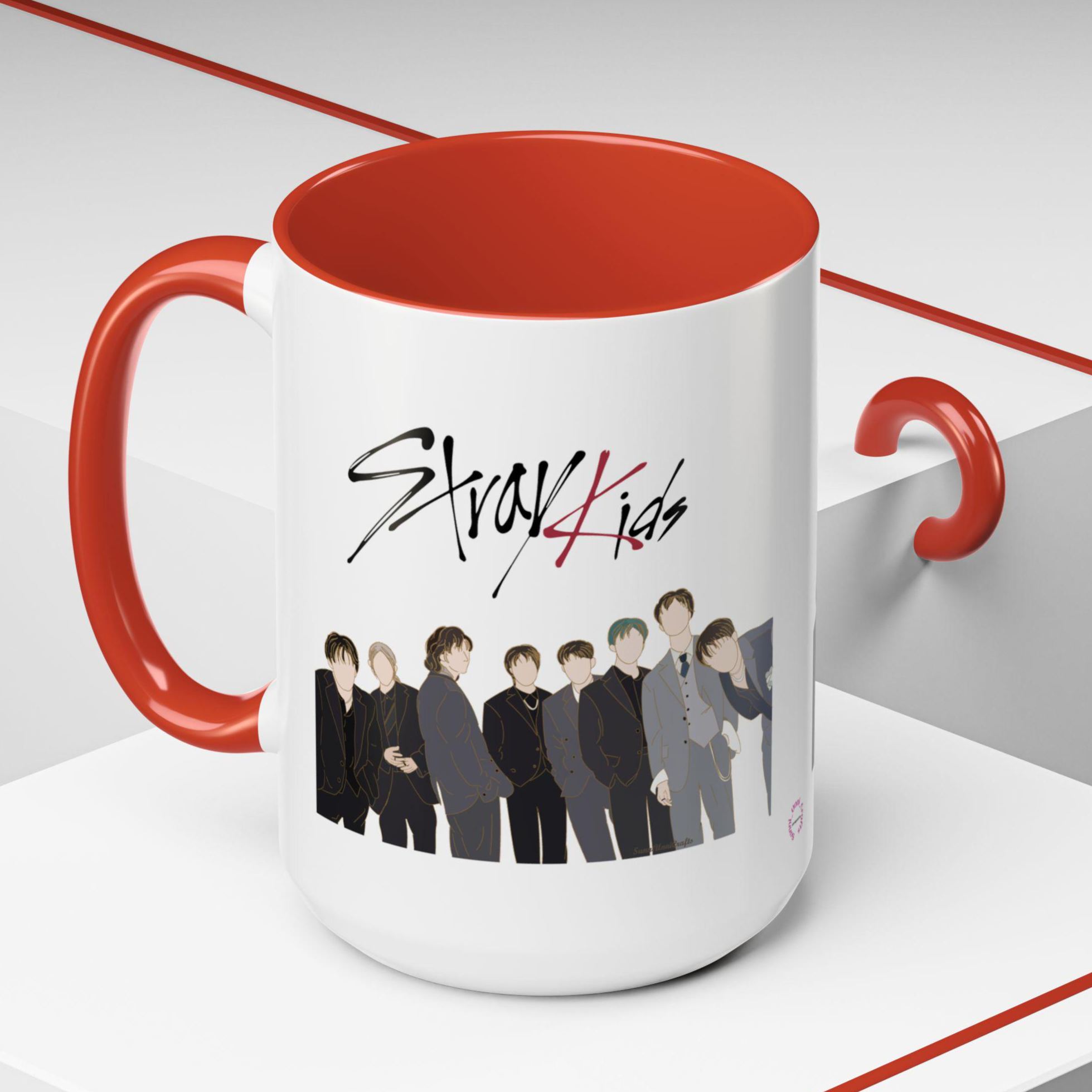 Ceramic coffee mug featuring Stray Kids character art on a white background with red interior and handle