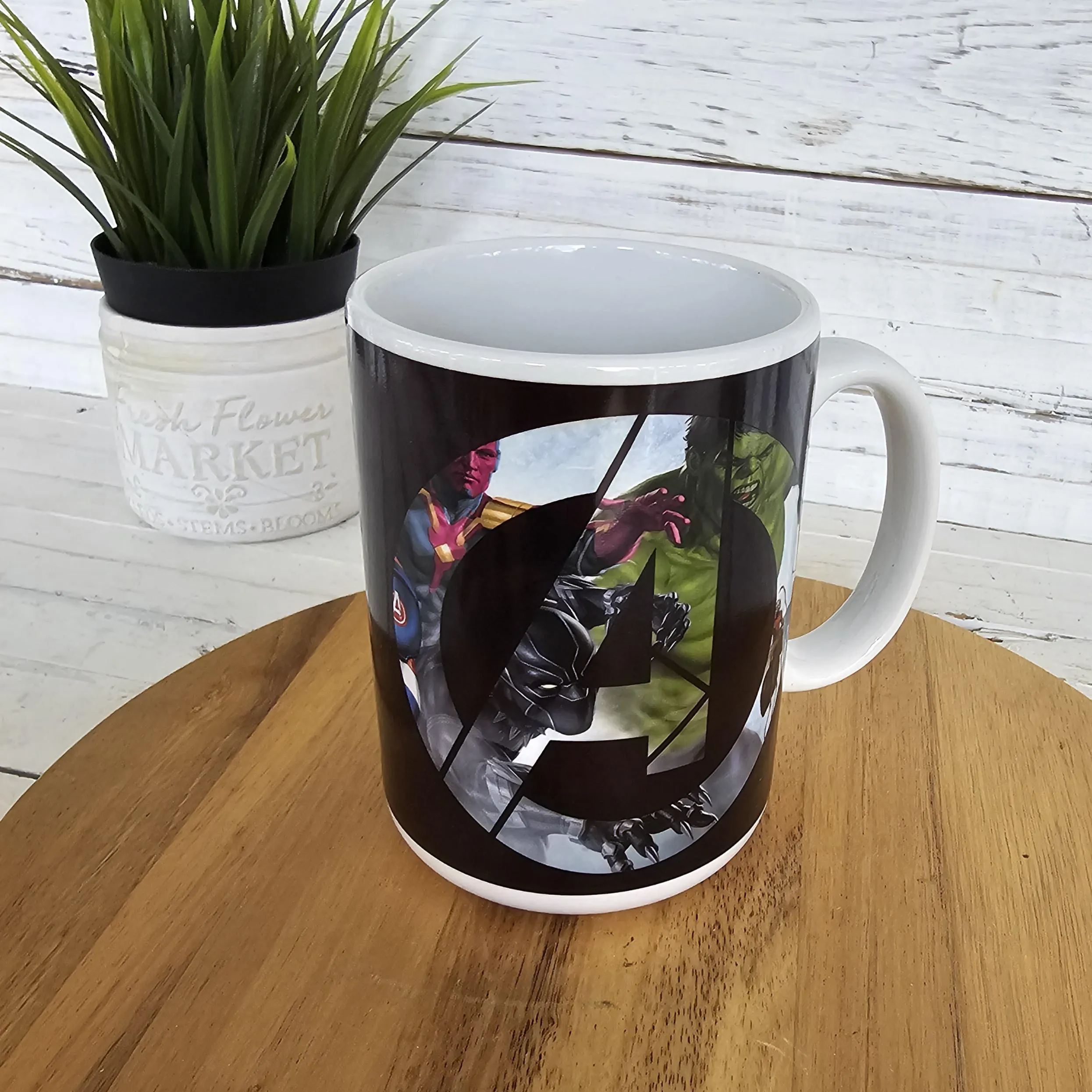 Action Character Print Ceramic Mug On Wooden Surface