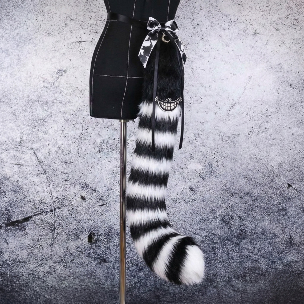 Ribbon Tied Blush Fur Tail