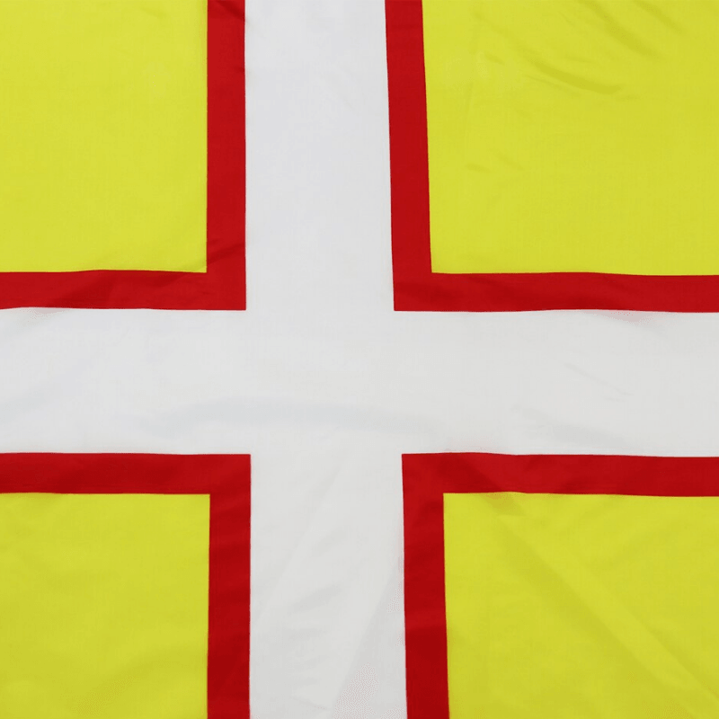 Saint Wites Flag flying on outdoor flagpole