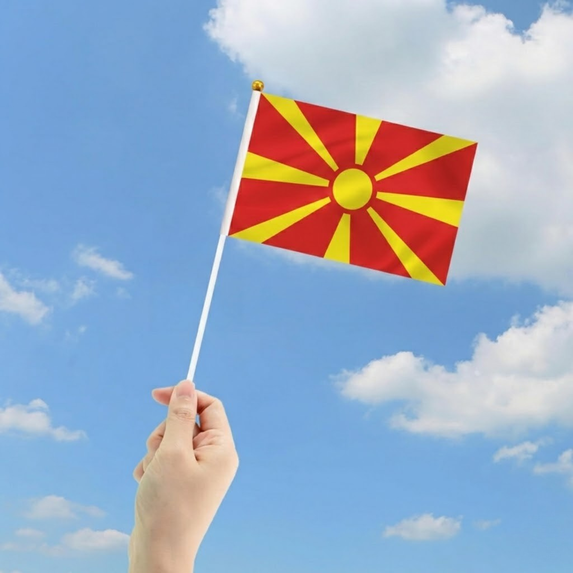 10 Pieces Of FIFA 2026 North Macedonia Mini Flag - displayed outdoors on flagpole