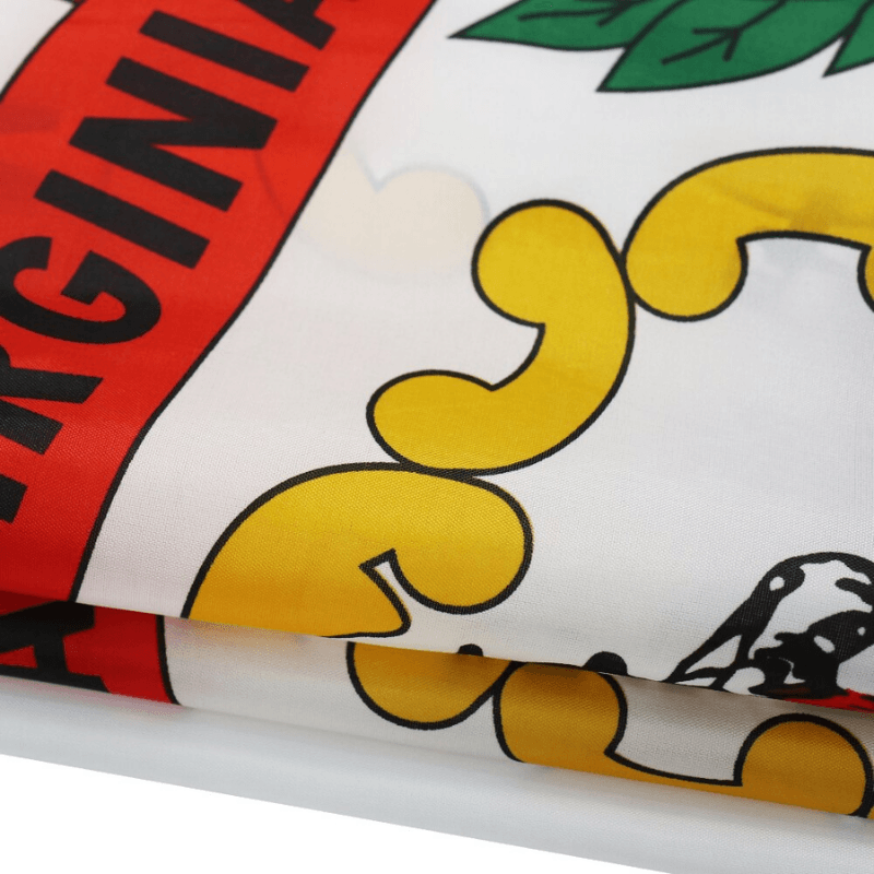 The West Virginia State Flag close-up showing fabric texture and vivid colors