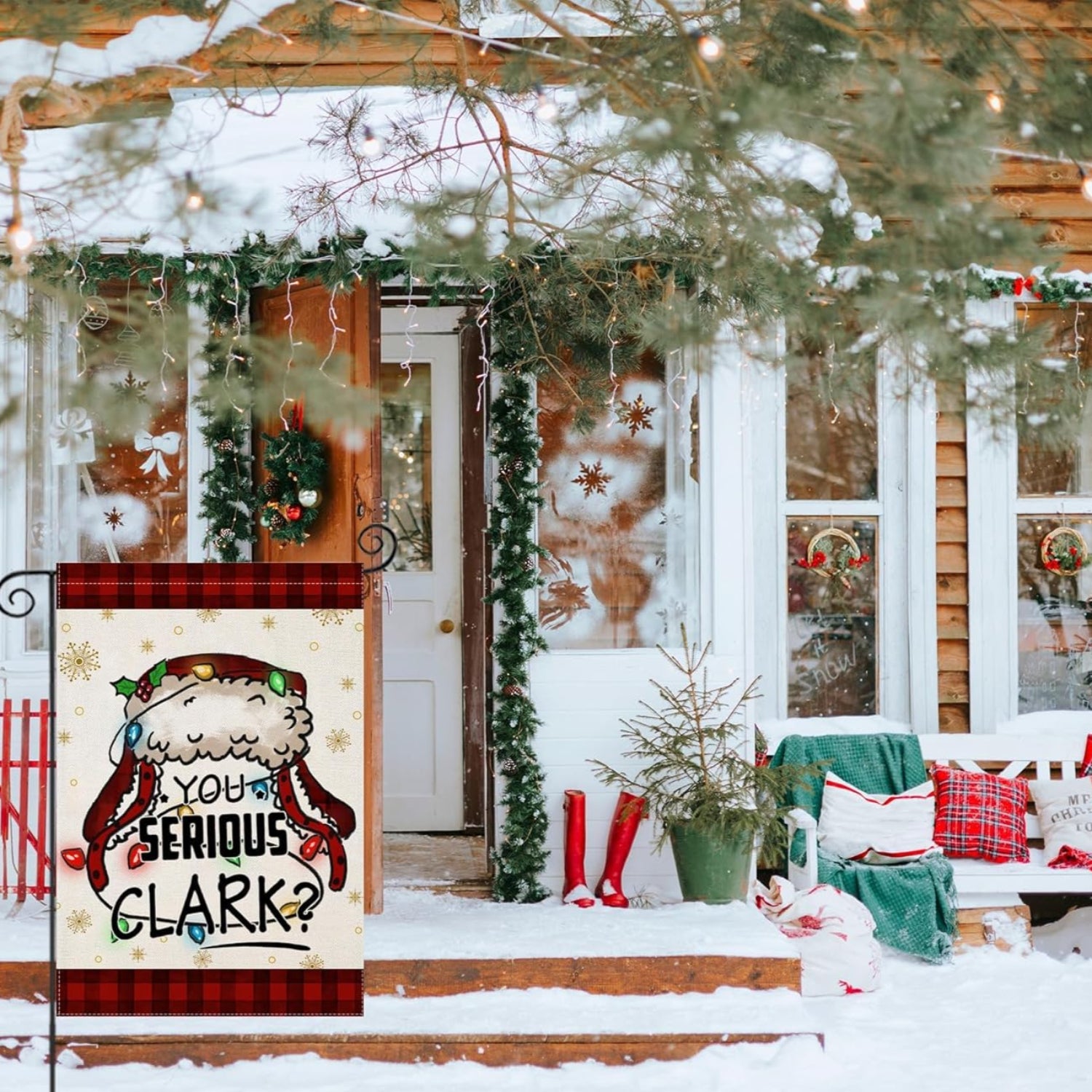 Double Sided Christmas Garden Flag For Outdoor Decoration displayed outdoors on garden stake