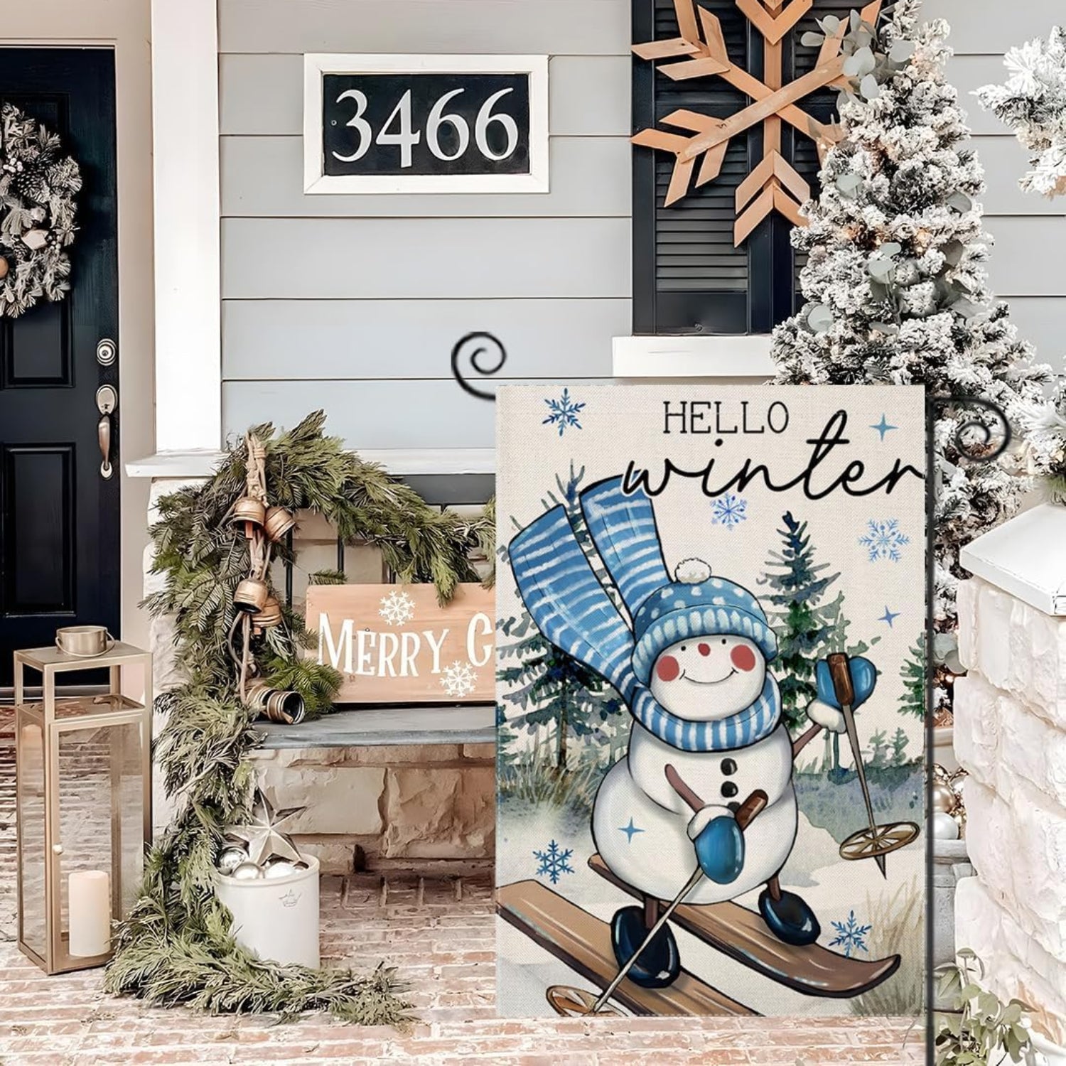 Snowman Printed Garden Flag - displayed outdoors on flagpole