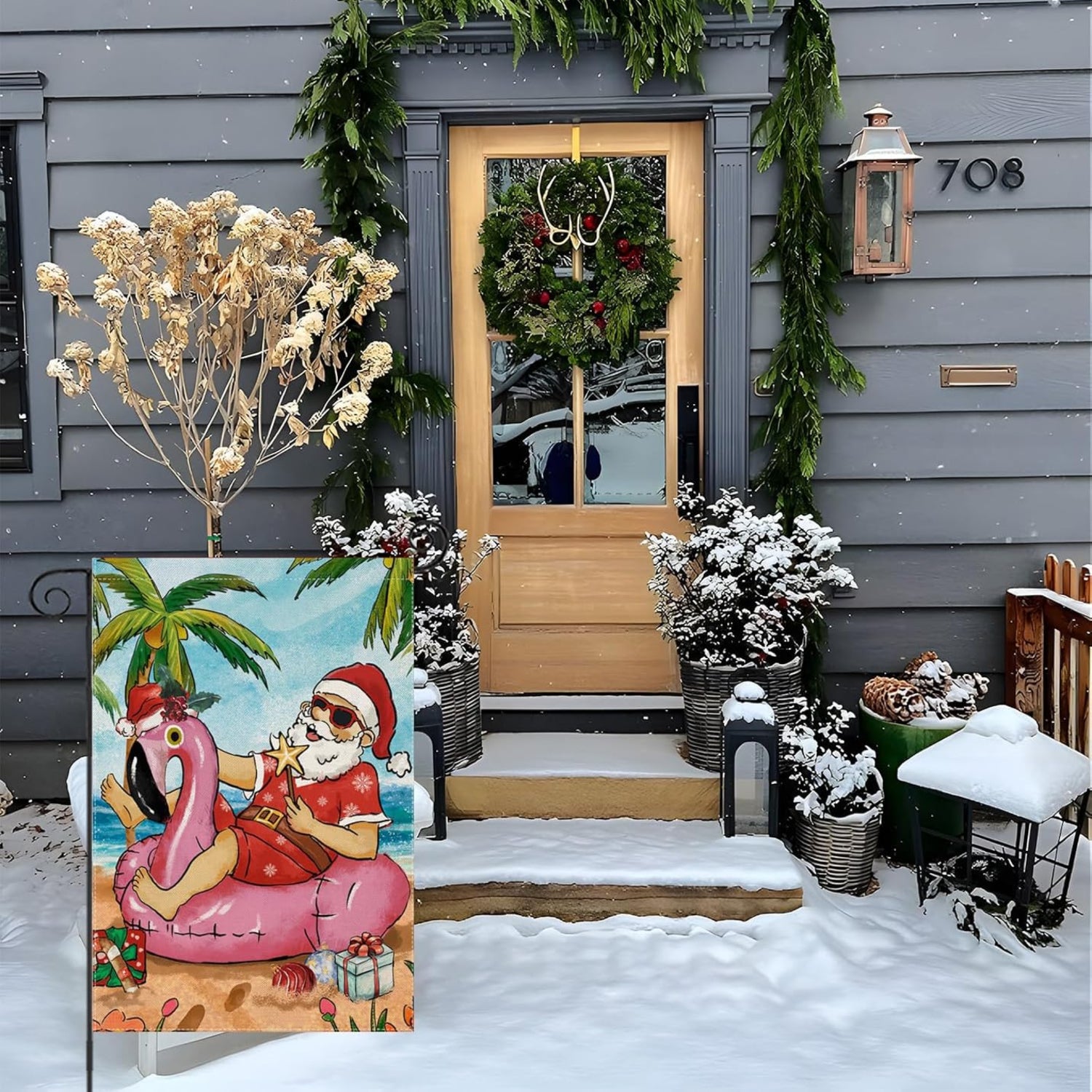 Tropical Santa Printed Christmas Garden Flag in garden yard setting