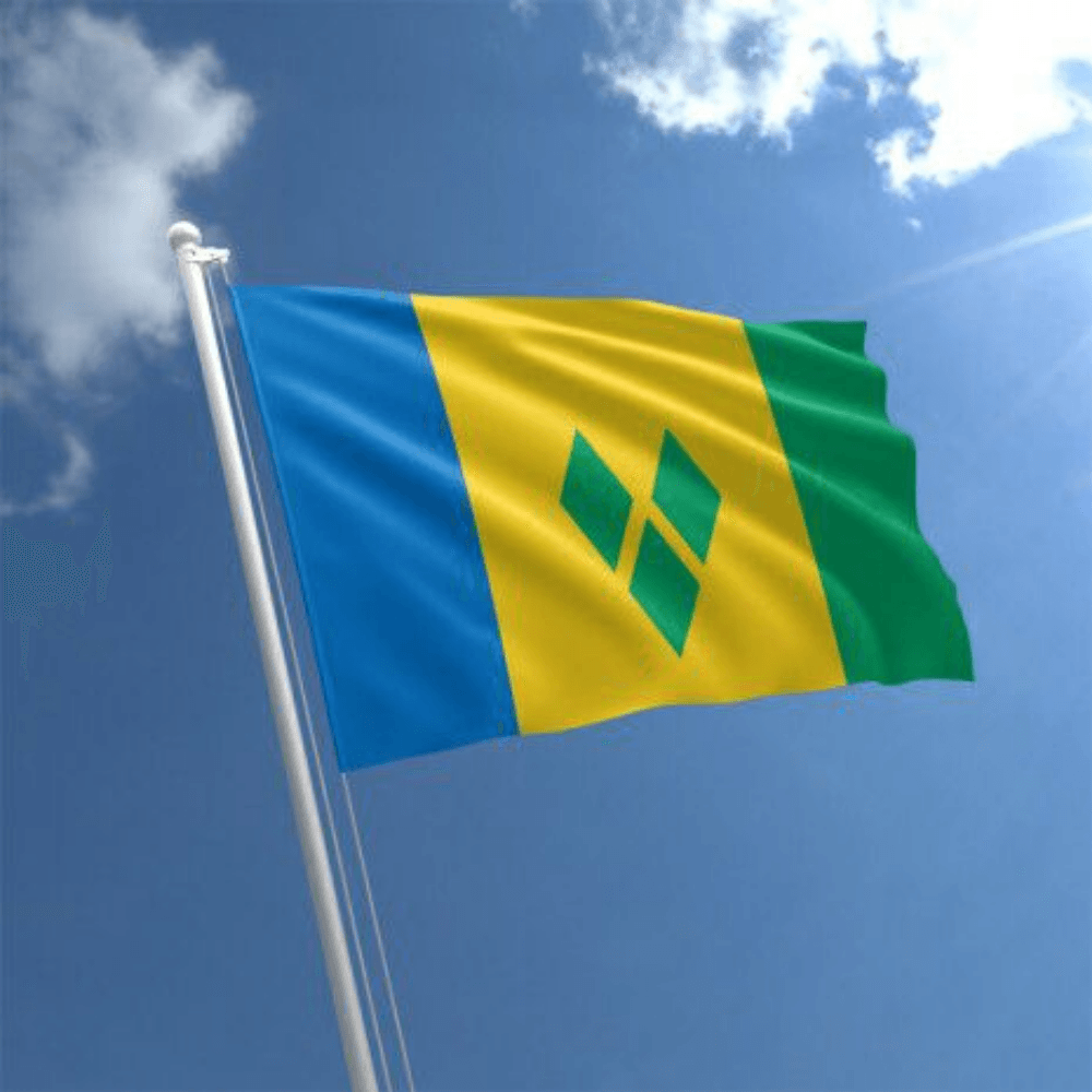 Saint Vincent Grenadines Flag flying on outdoor flagpole