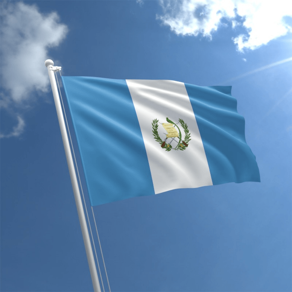Guatemala Country National Flag flying on outdoor flagpole