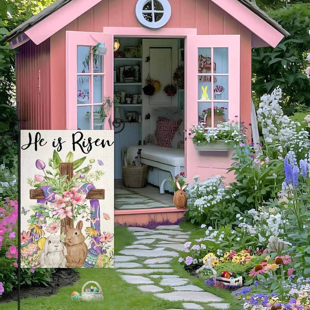 He Is Risen Printed Garden Flag in garden yard setting