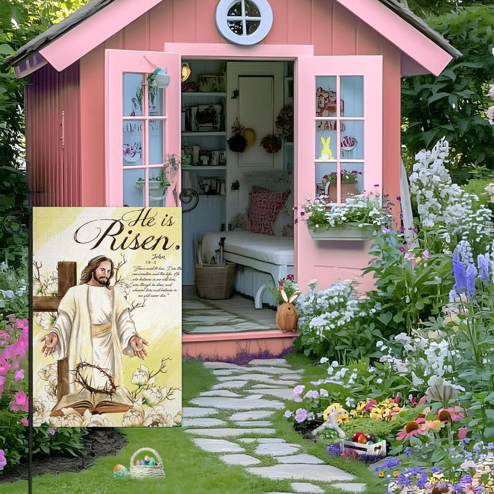 Jesus With Cross He Is Risen Small Printed Easter Garden Flag displayed outdoors on garden stake