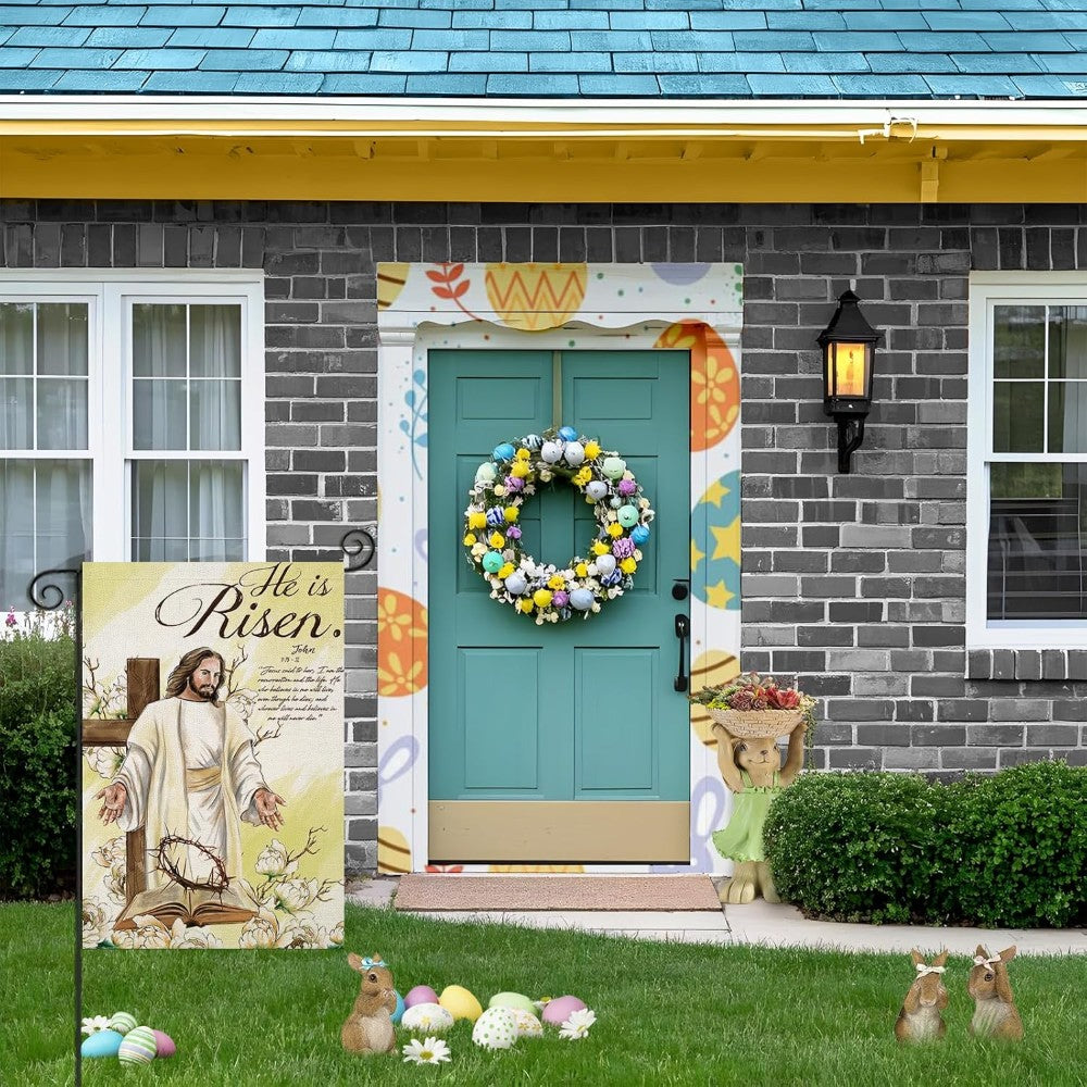 Jesus With Cross He Is Risen Small Printed Easter Garden Flag in garden yard setting
