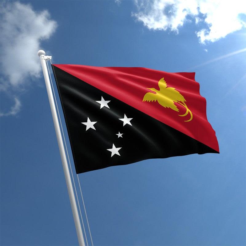 Papua New Guinean Flag flying on outdoor flagpole