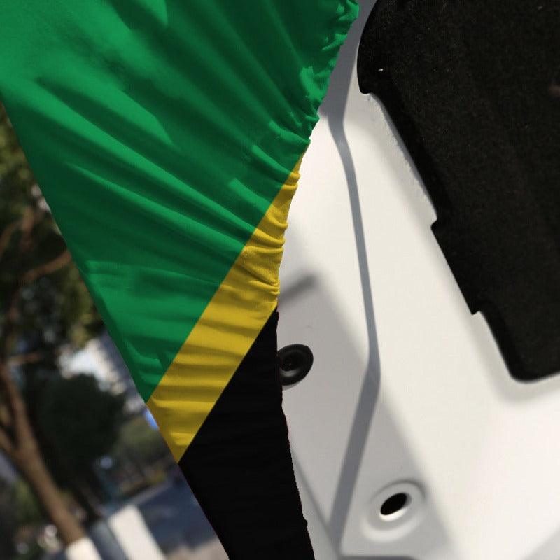Nevis Flag Car Hood-Cover mounted on car hood while driving