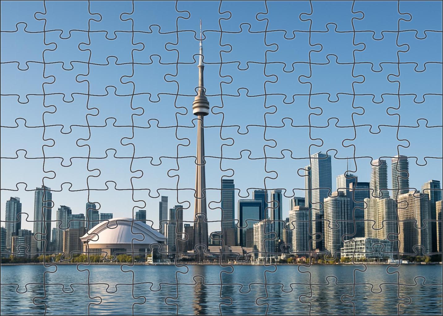 Toronto Lakefront Skyline Dominated By The Iconic Cn Tower Soaring Above Mixed-use High-rises Along The Waterfront Puzzle Challenge