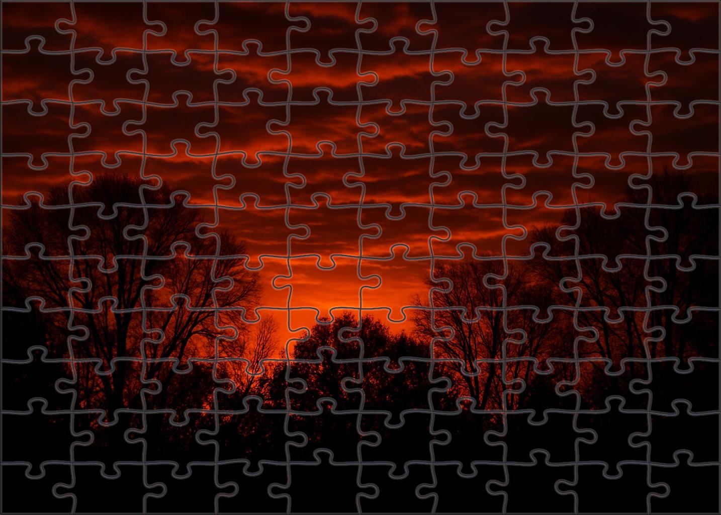 Copper Glow Amidst Silhouetted Trees Mini Puzzle