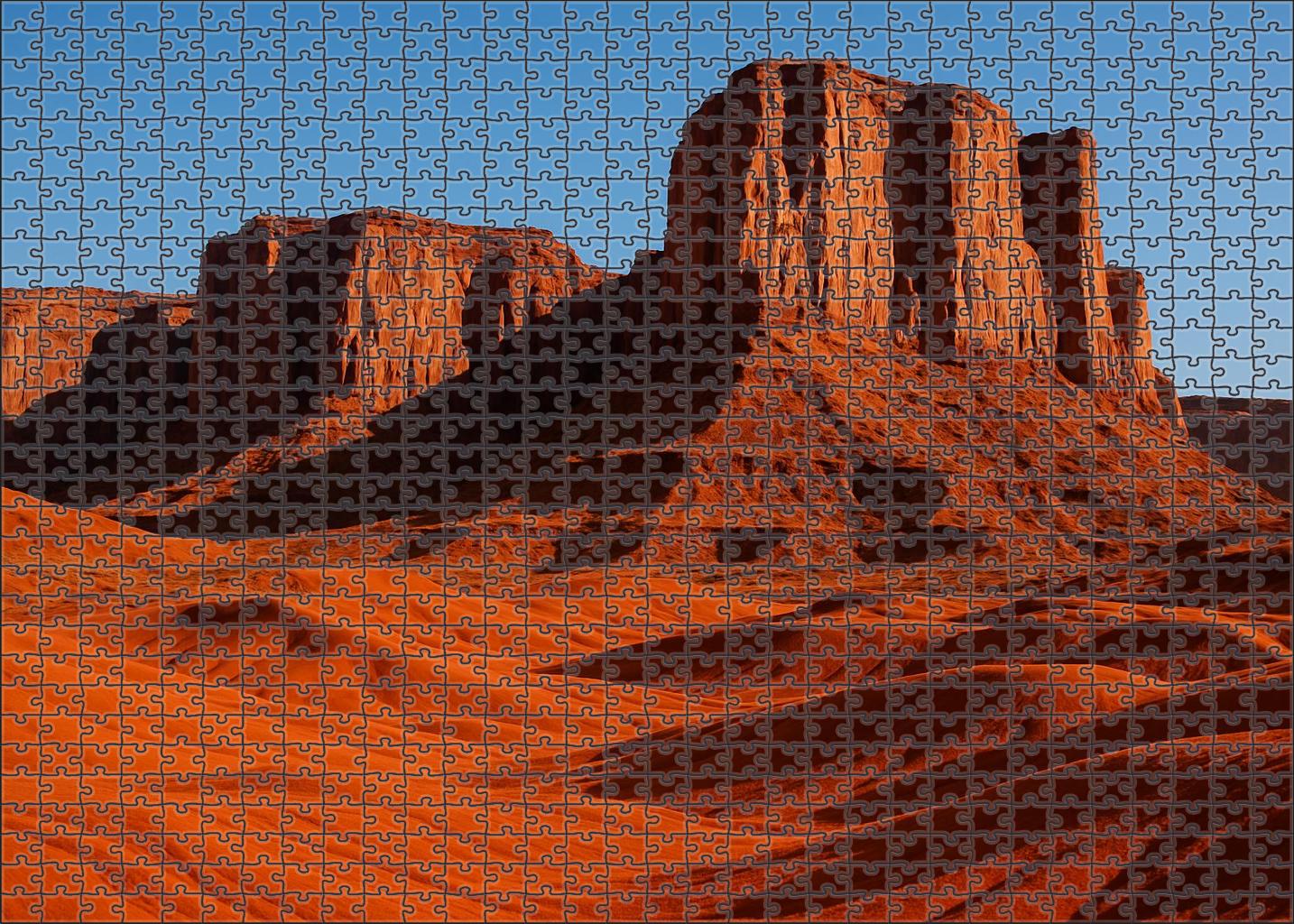 Echo Basin Rugged Sandstone Outcrops Amid Red Sands Puzzle Challenge