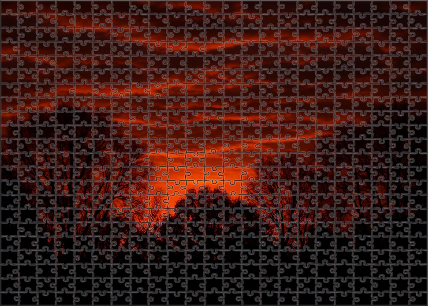 Copper Glow Amidst Silhouetted Trees Mini Puzzle