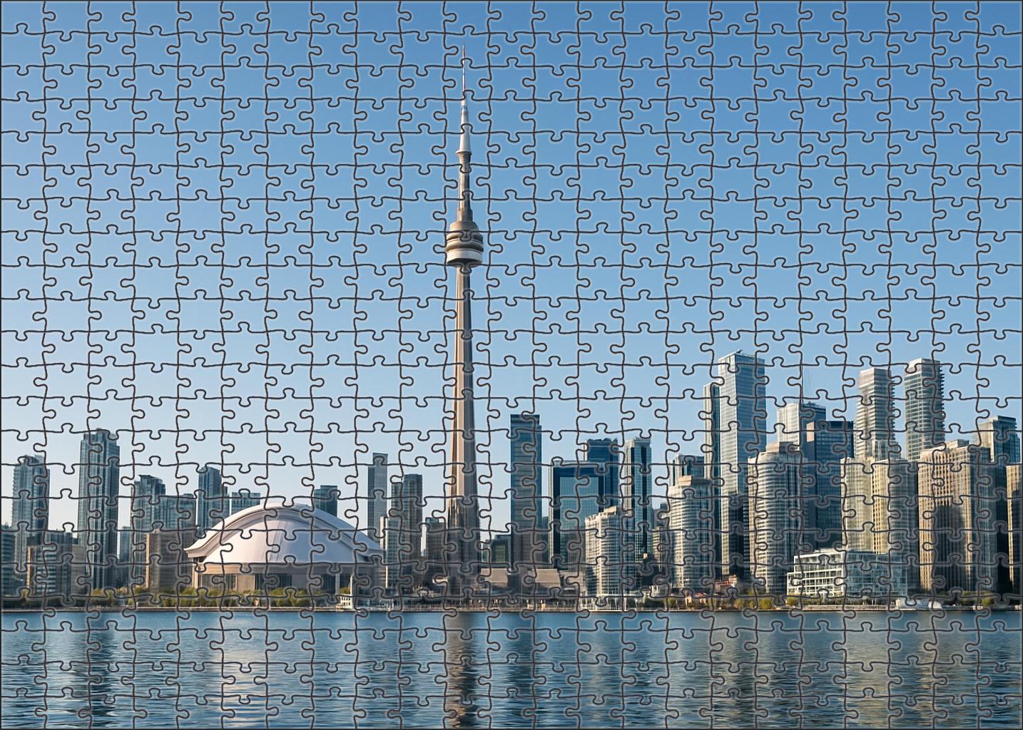 Toronto Lakefront Skyline Dominated By The Iconic Cn Tower Soaring Above Mixed-use High-rises Along The Waterfront Puzzle Challenge
