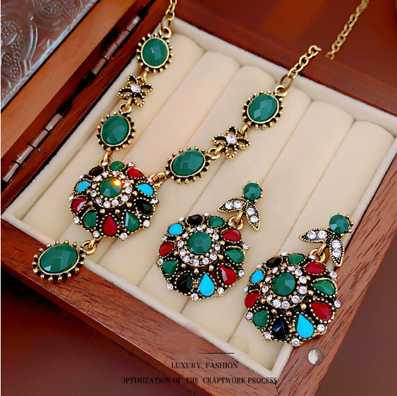 Colored diamond-encrusted round flower necklace and earrings