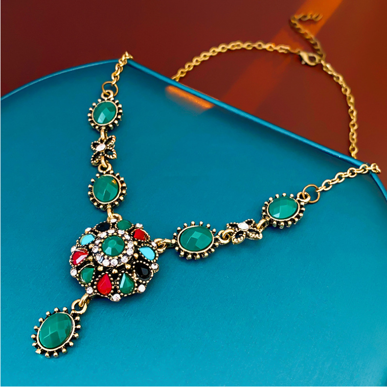 Colored diamond-encrusted round flower necklace and earrings