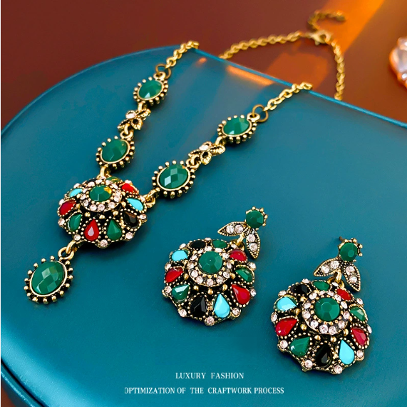 Colored diamond-encrusted round flower necklace and earrings