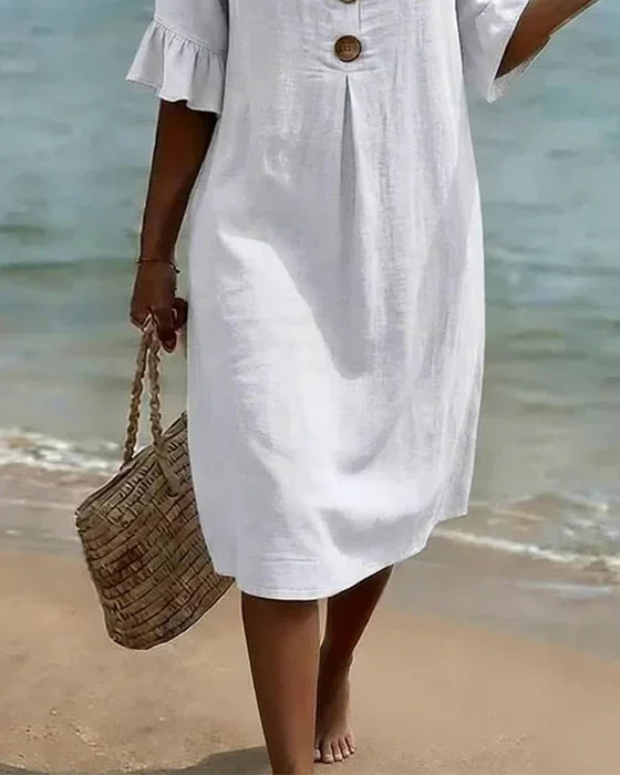 Women's dress with puff sleeves and buttons