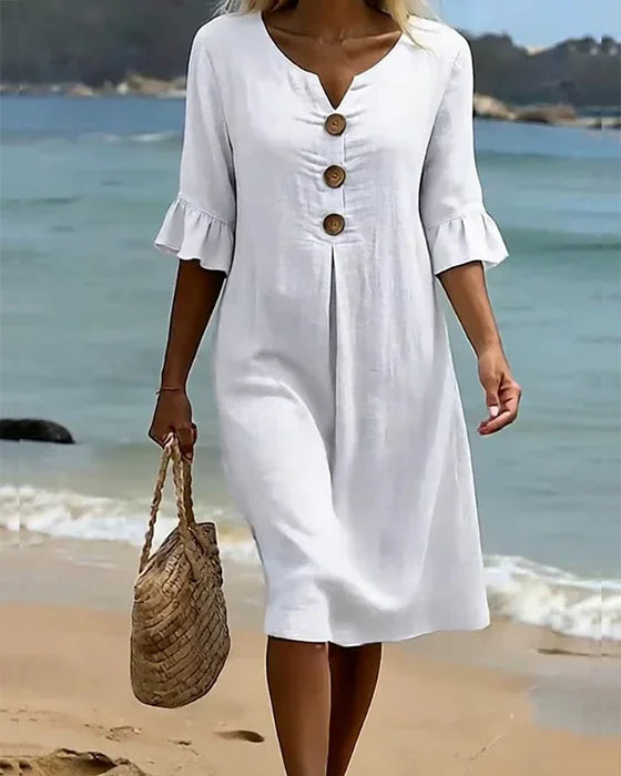 Women's dress with puff sleeves and buttons
