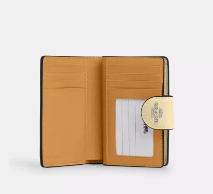 Medium Corner Zip Wallet In Signature Canvas