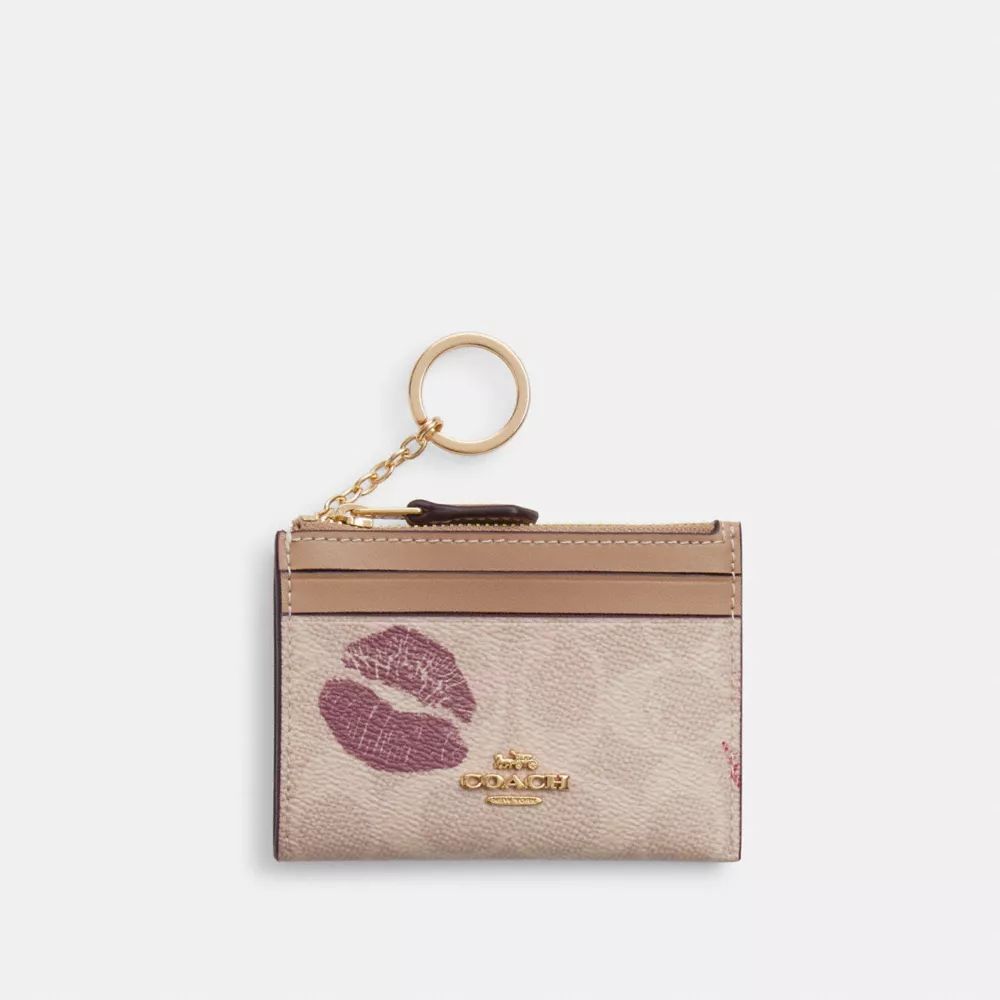 Mini Id Skinny Case In Signature Canvas With Lips Print