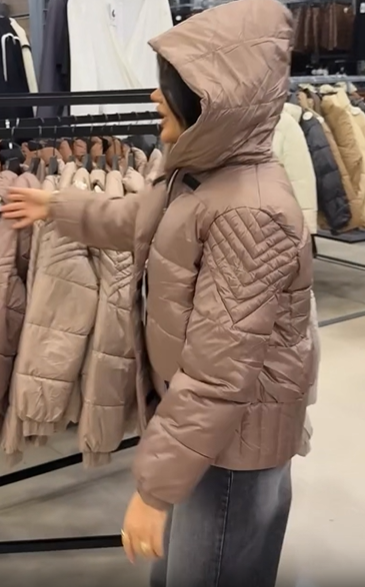 Quilted sleeve down jacket with hood