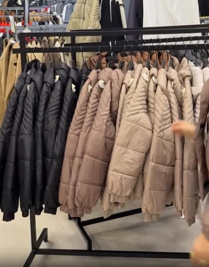 Quilted sleeve down jacket with hood