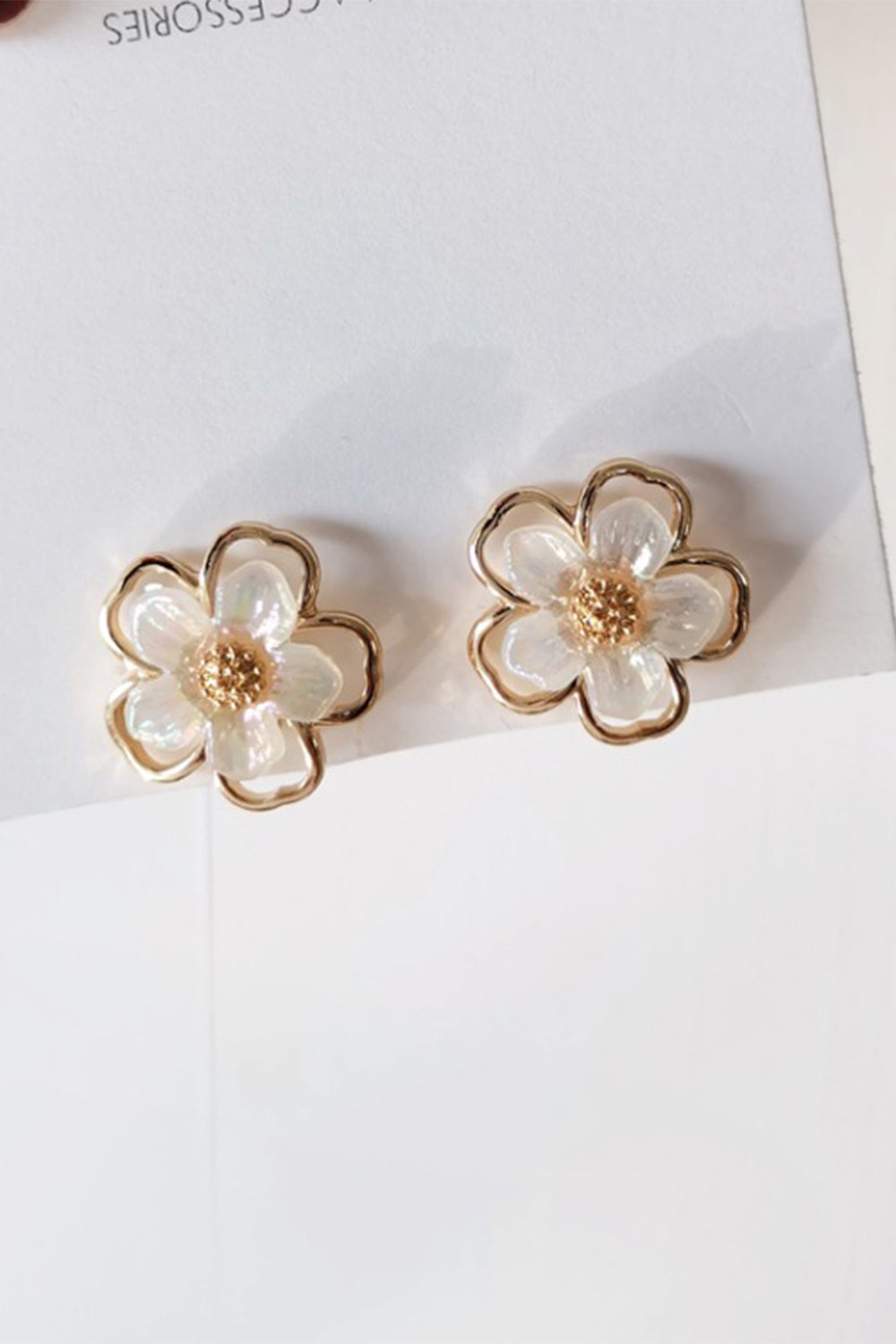 Earrings with White Floral Design