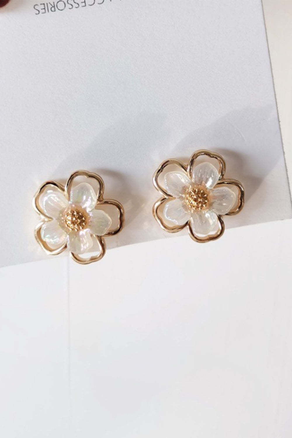 Earrings with White Floral Design