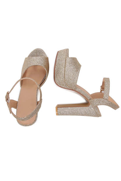 Light golden one-strap high heel sandals with a chunky design