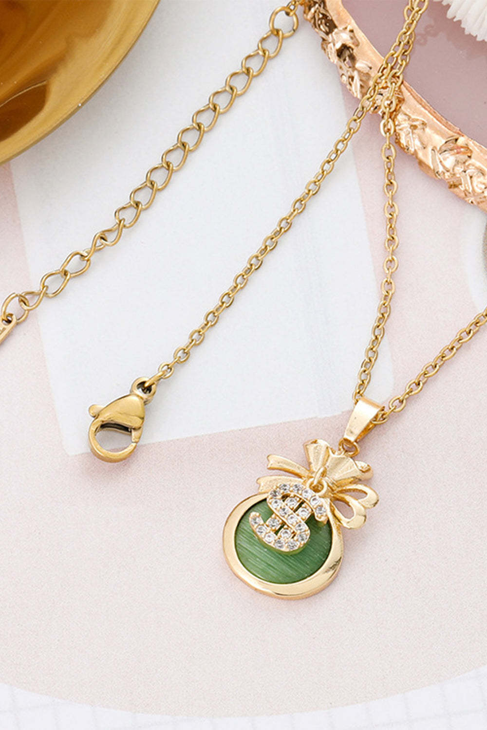 Necklace Featuring a Golden Money Bag