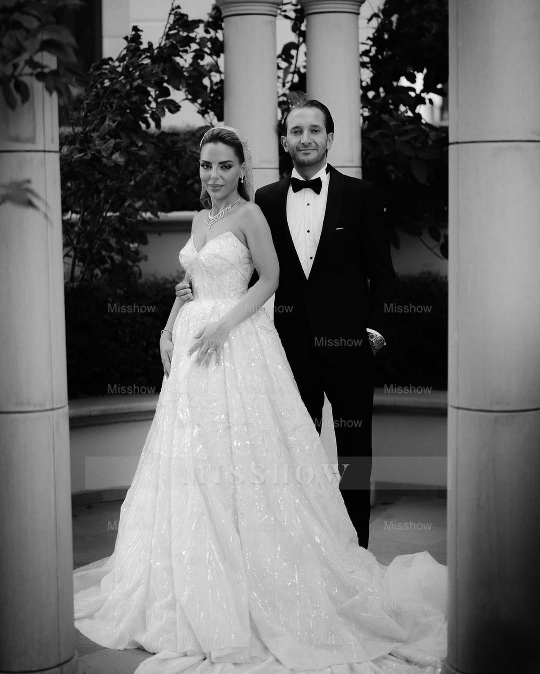 Chic White Ball Gown Sweetheart Sleeveless Sequined Chapel Train Tulle Wedding Dress