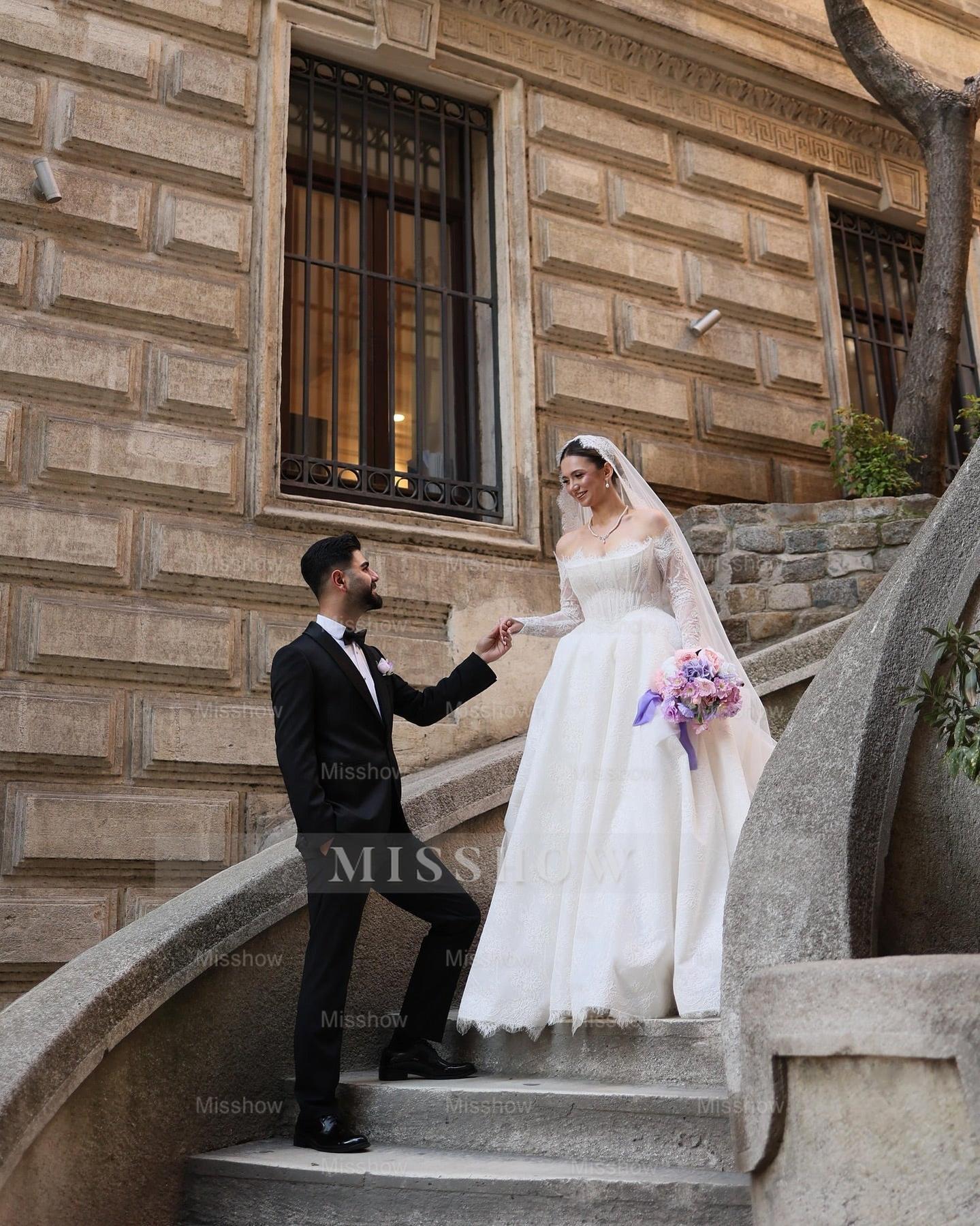 Elegant Ivory Strapless Long-Sleeve Ball Gown Wedding Dress with Chapel Train