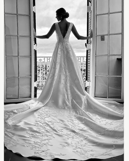 Elegant White A-Line V-Neck Sleeveless Cathedral Train Satin Wedding Dress With Appliques