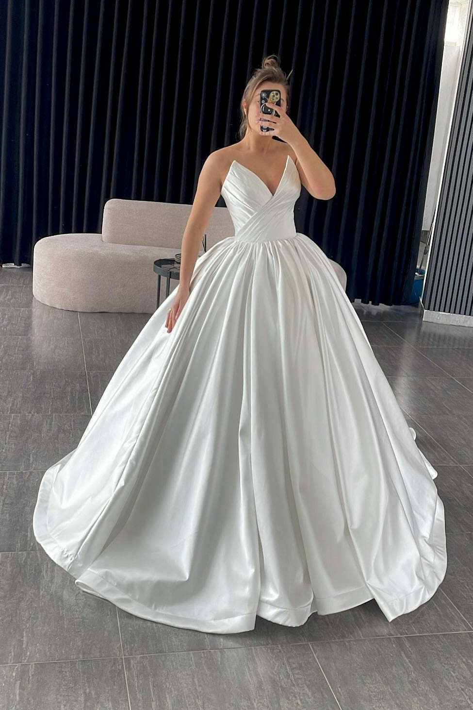 Graceful Ivory V-Neck Sleeveless Ball Gown Wedding Dress with Ruffles