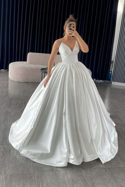 Graceful Ivory V-Neck Sleeveless Ball Gown Wedding Dress with Ruffles