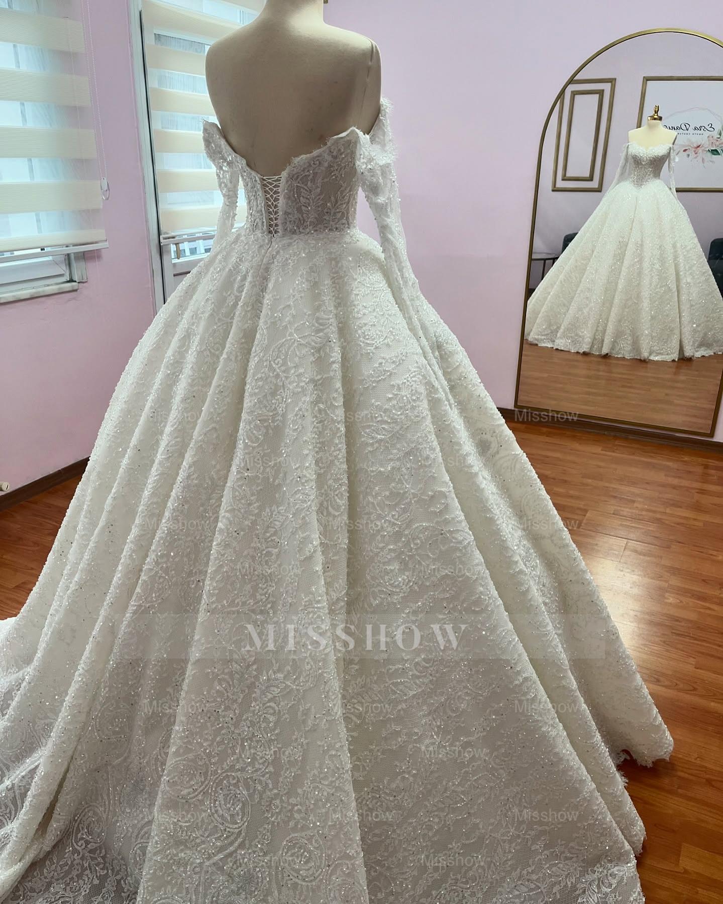 Stunning Ivory Sweetheart Long-Sleeve Ball Gown Wedding Dress with Sequins