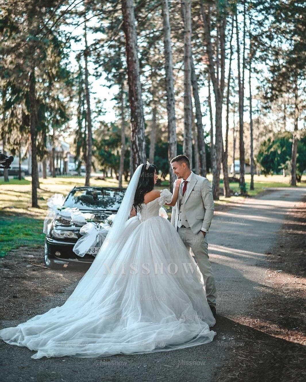 Stunning White Sweetheart Ball Gown Off-The-Shoulder Sleeveless Cathedral Train Ruffles Tulle Wedding Dresses