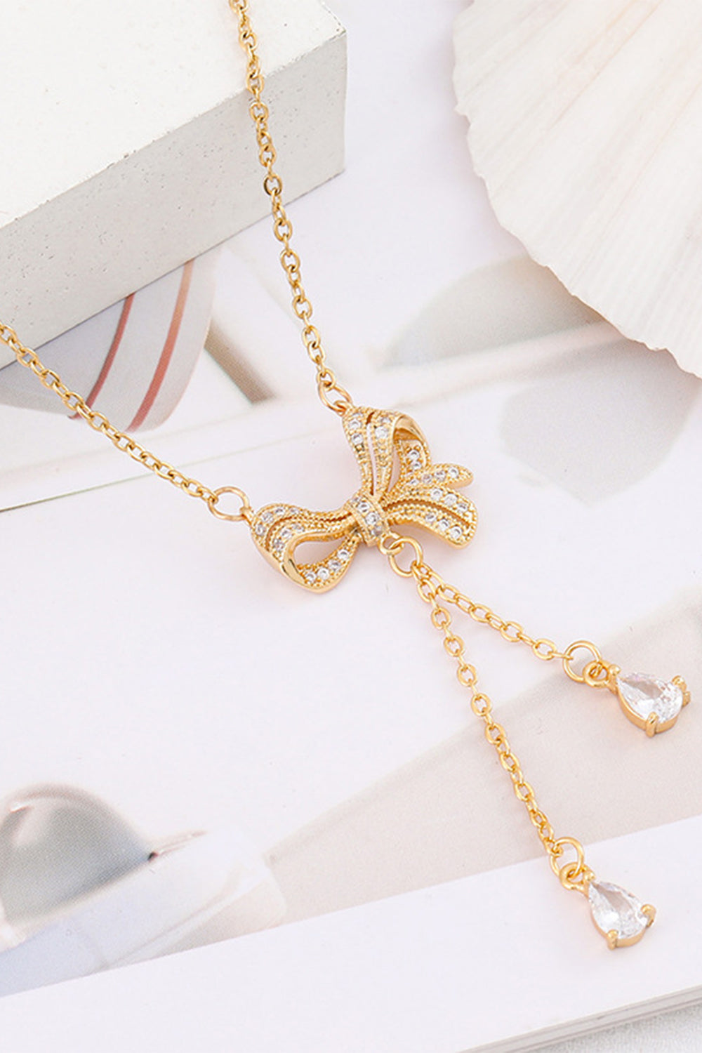 Necklace with a Golden Bow