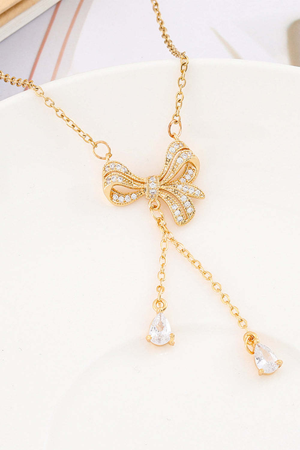 Necklace with a Golden Bow