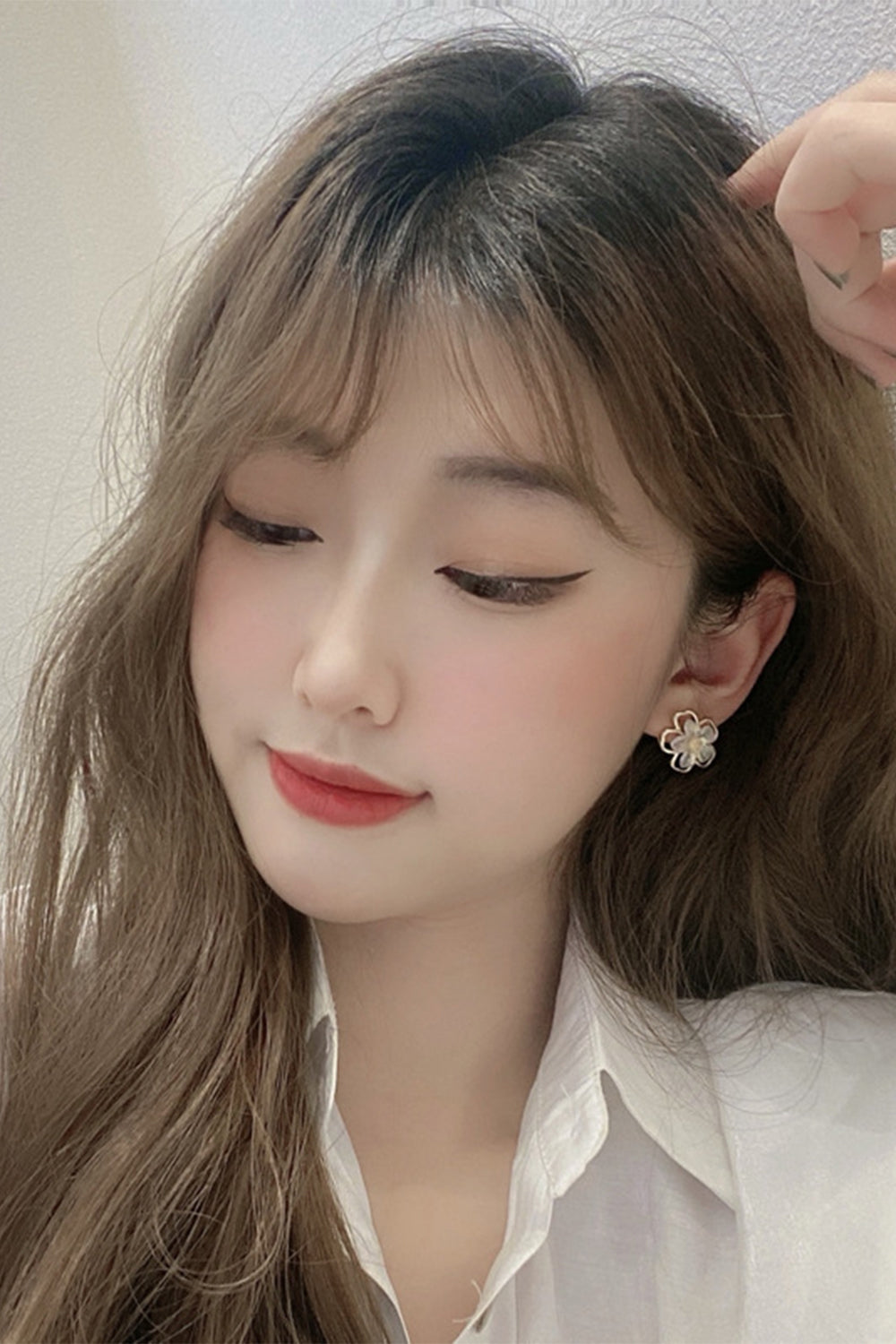 Earrings with White Floral Design