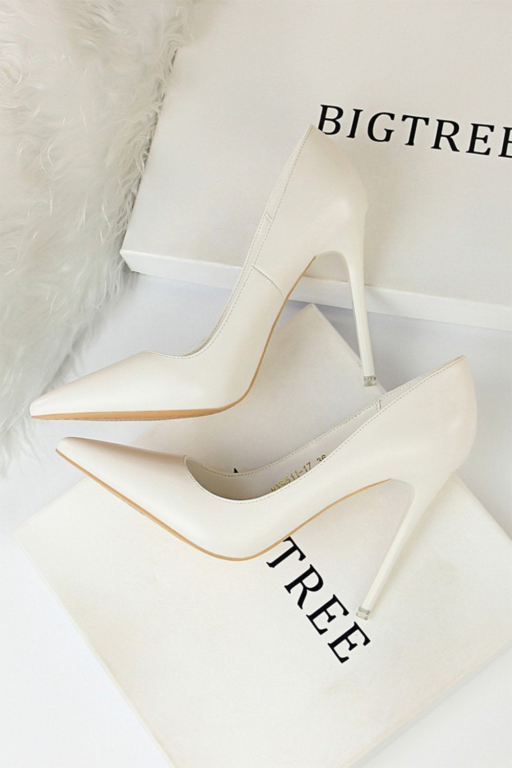 Pointed Stiletto Heels with a Shallow Mouth and Super High Heel