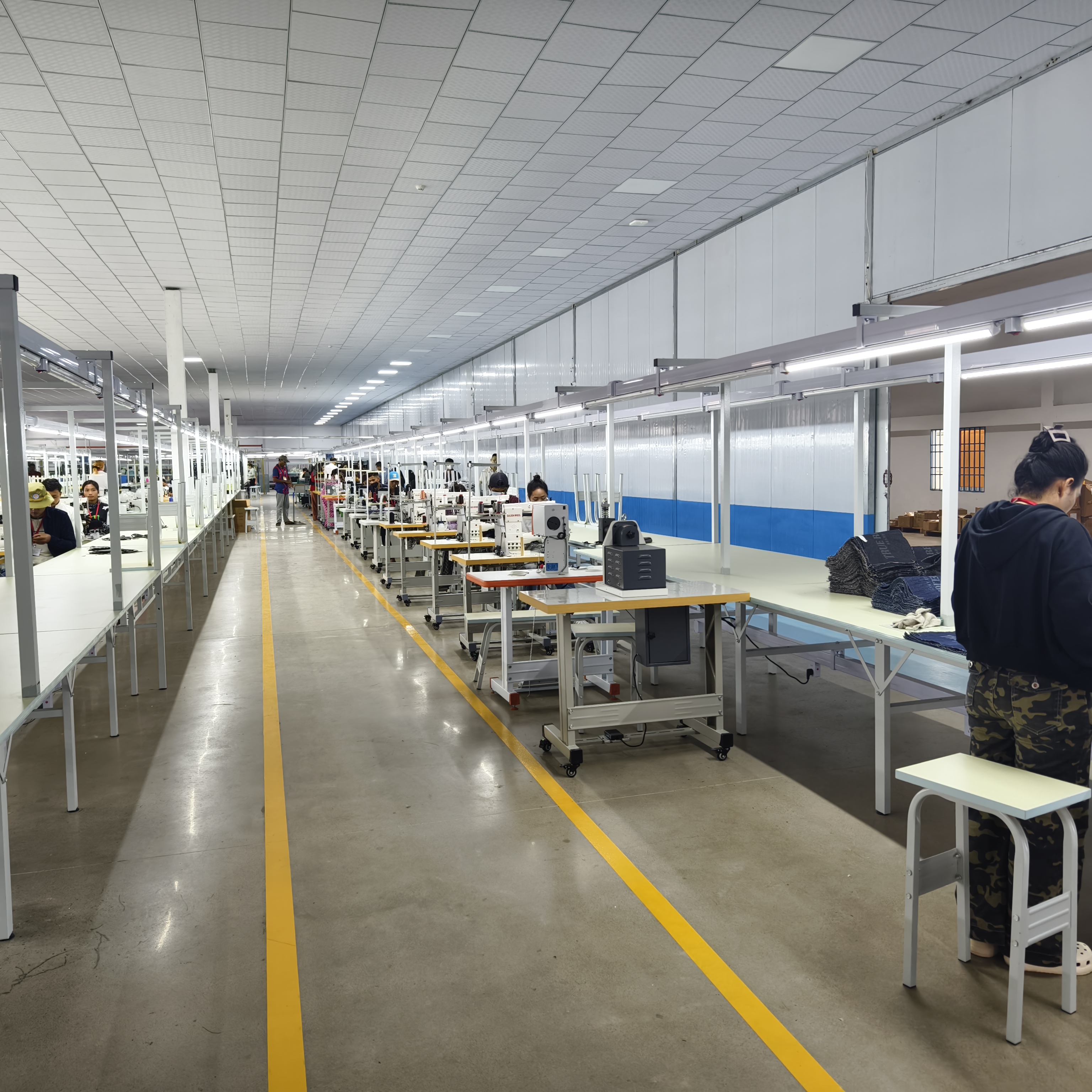 Production line in Cambodia handbag factory with stable manufacturing process
