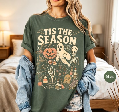 Retro Halloween T-shirts – Retro ghost, pumpkin, and skull patterned t-shirts | Soft, unisex cotton crew neck t-shirts, perfect for fall and holiday parties.
