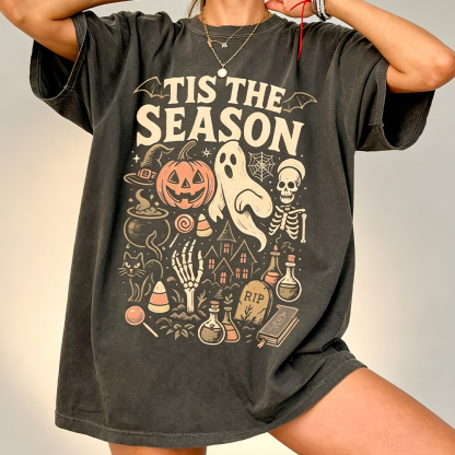 Retro Halloween T-shirts – Retro ghost, pumpkin, and skull patterned t-shirts | Soft, unisex cotton crew neck t-shirts, perfect for fall and holiday parties.