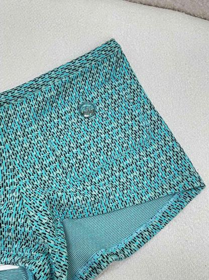 CHNEL green tweed shorts